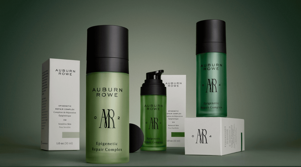 Green and white bottles of various Auburn Rowe products