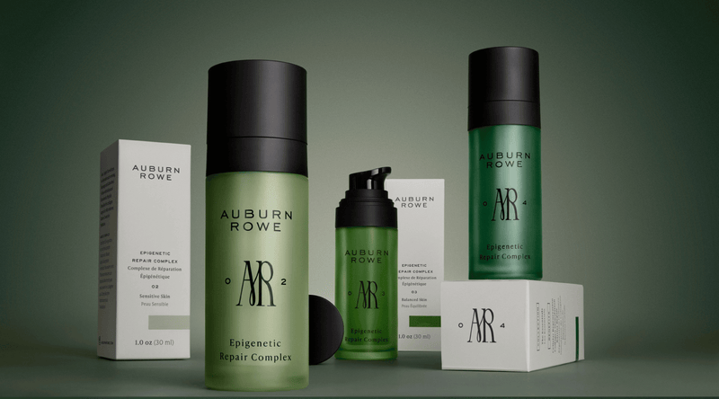Green and white bottles of various Auburn Rowe products