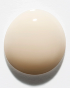 A droplet of Auburn Rowe BioVital Rejuvenation Serum for the AR.04 Melanin-Rich profile