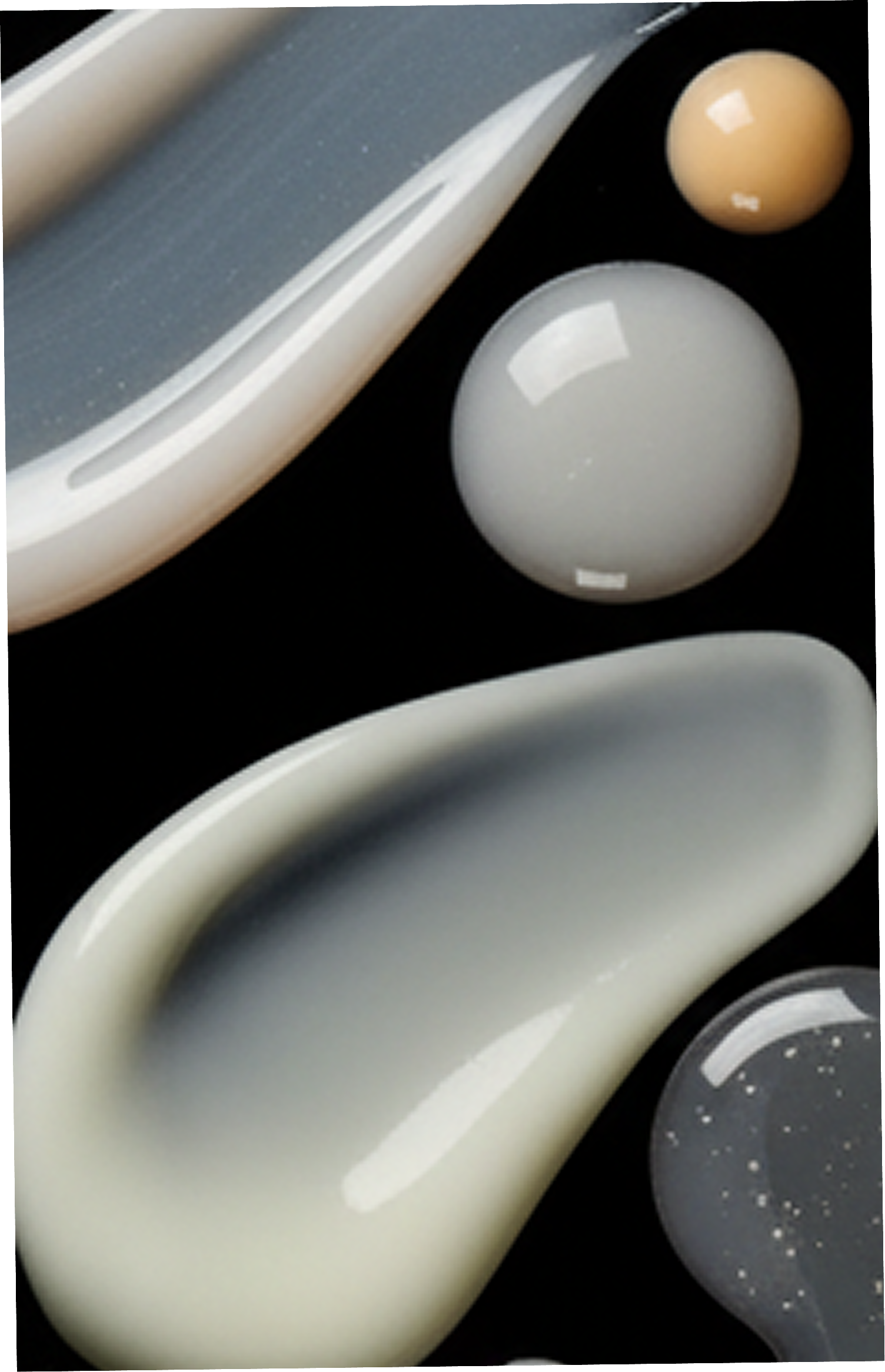 Close-up of various smooth, polished stones on a black background