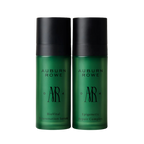 Two green bottles of Auburn Rowe serum with black caps on a white background