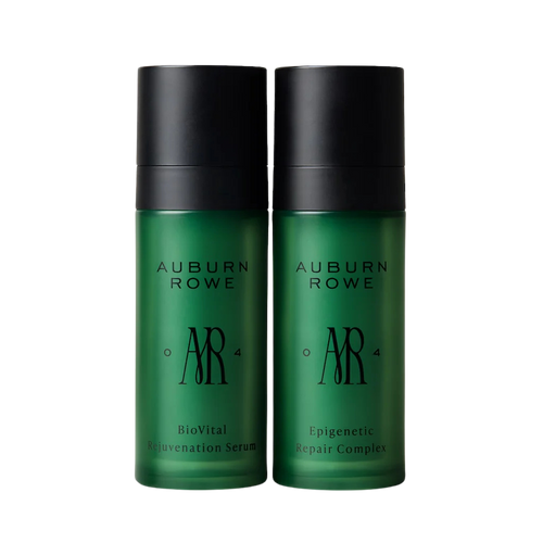 Two green bottles of Auburn Rowe serum with black caps on a white background