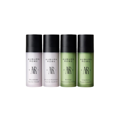 Four bottles of Auburn Rowe skincare products on a white background